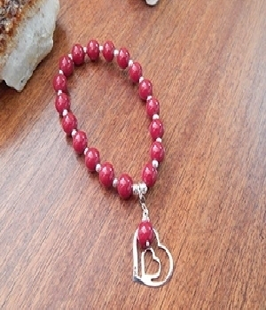 Imagen de Pulsera de plata con bolas rojas y corazon numero 0