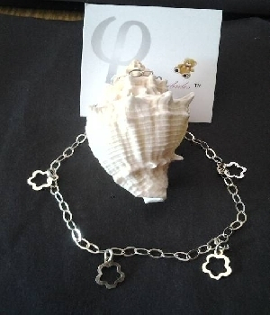 Imagen de Pulsera de plata con figuras. numero 0